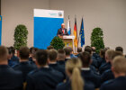 Blick aus Publikum Richtung Bühne zu Herrmann am Rednerpult